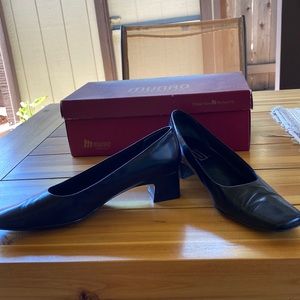 Nordstrom brand black leather pumps. Good condition.